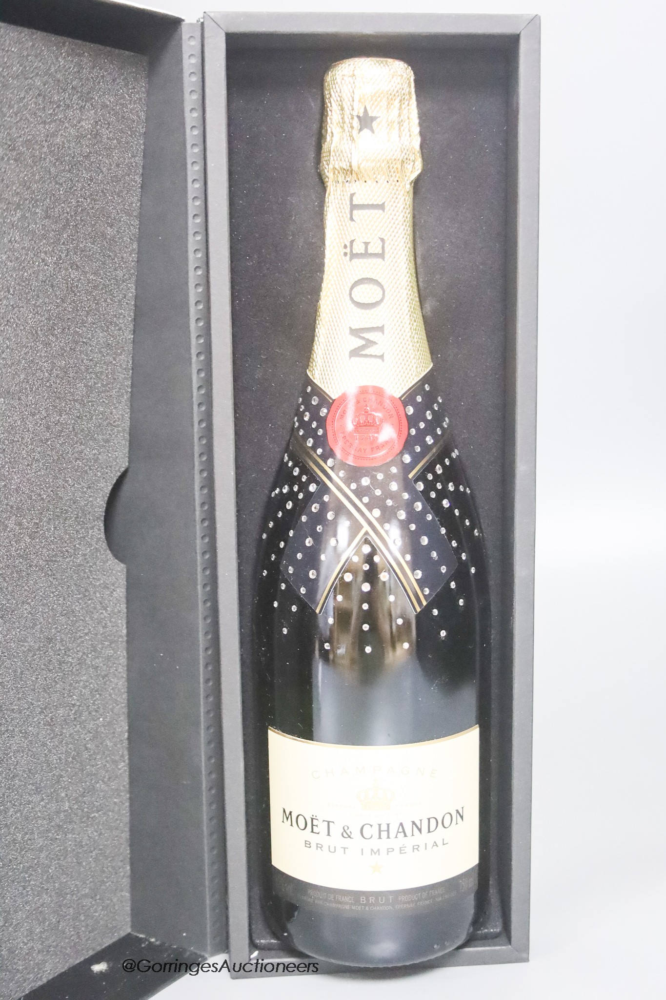 A bottle of 1998 Dom Perignon champagne, in a sealed presentation box and a bottle of Moet Chandon 'diamond' champagne, boxed